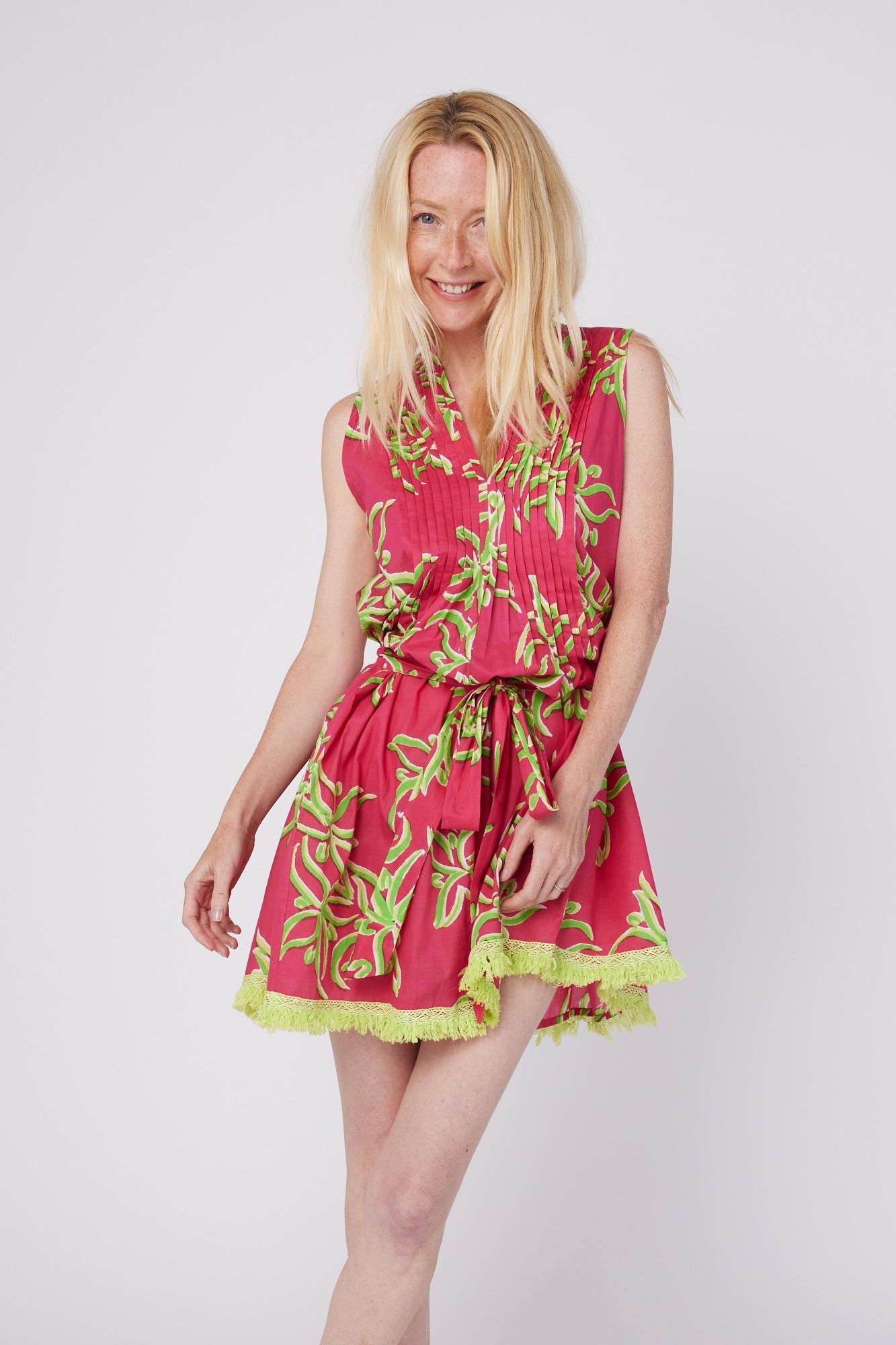 ModaPosa Felice Sleeveless V-Neck Puntuck Knee Length Dress with Detachable Belt in Raspberry Lime Flower . Discover women's resort dresses and lifestyle clothing inspired by the Mediterranean. Free worldwide shipping available!