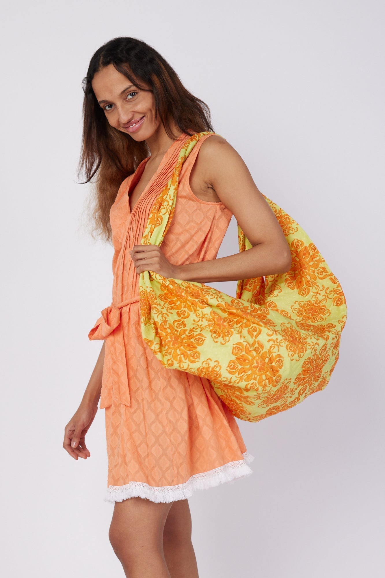 ModaPosa Felice Sleeveless V-Neck Puntuck Knee Length Dress with Detachable Belt in Paradise Orange . Discover women's resort dresses and lifestyle clothing inspired by the Mediterranean. Free worldwide shipping available!