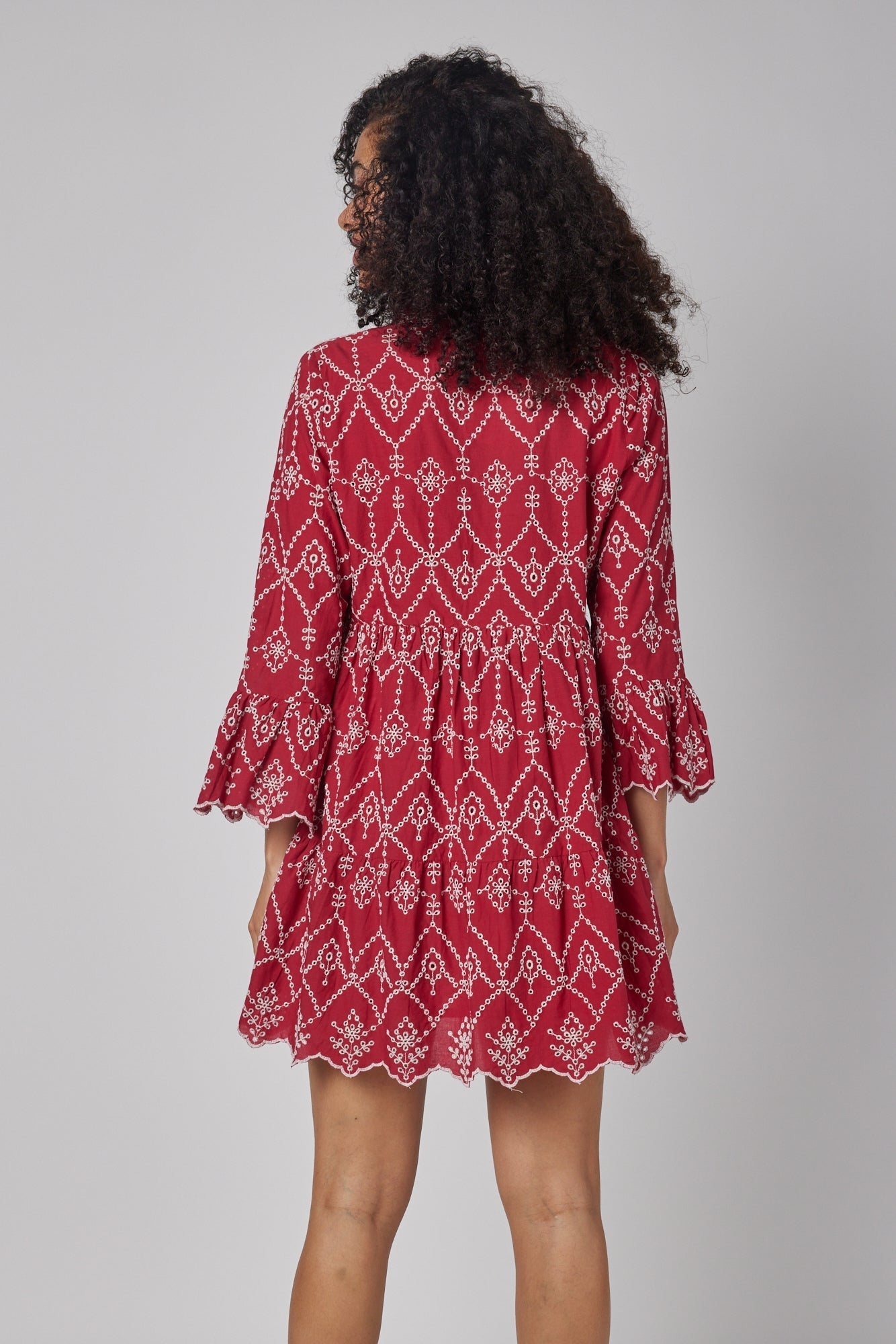 ModaPosa Cadenza Flared Sleeve Eyelet Empire Short Dress. Shop women's resort and lifestyle clothing inspired by the Mediterranean, Italy.