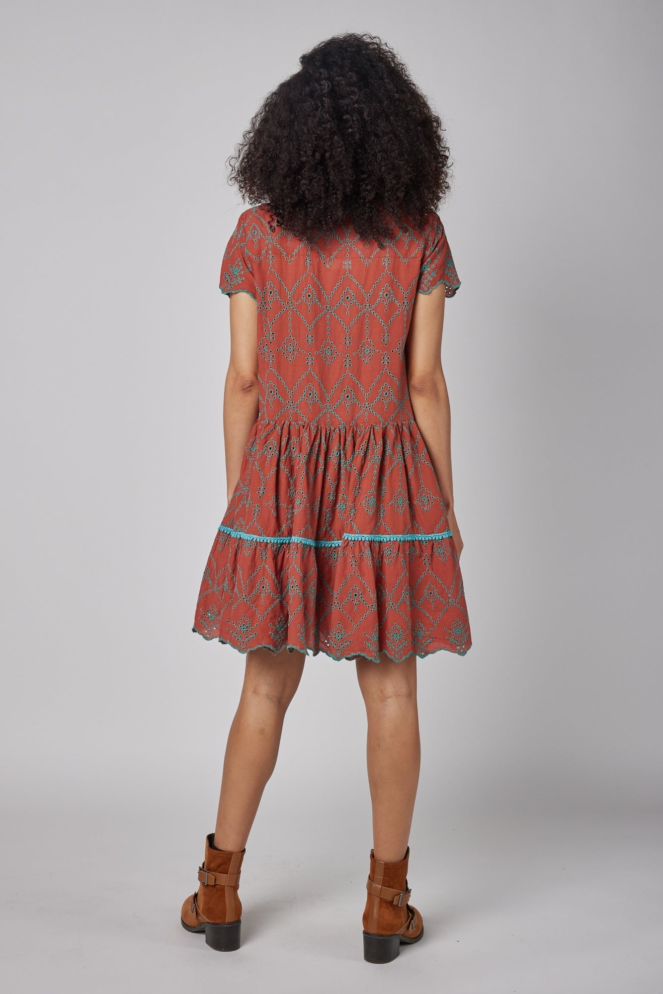 ModaPosa Simonetta Short Sleeve Hand Embroidered Eyelet Dress. Shop women's resort and lifestyle clothing inspired by the Mediterranean, Italy.