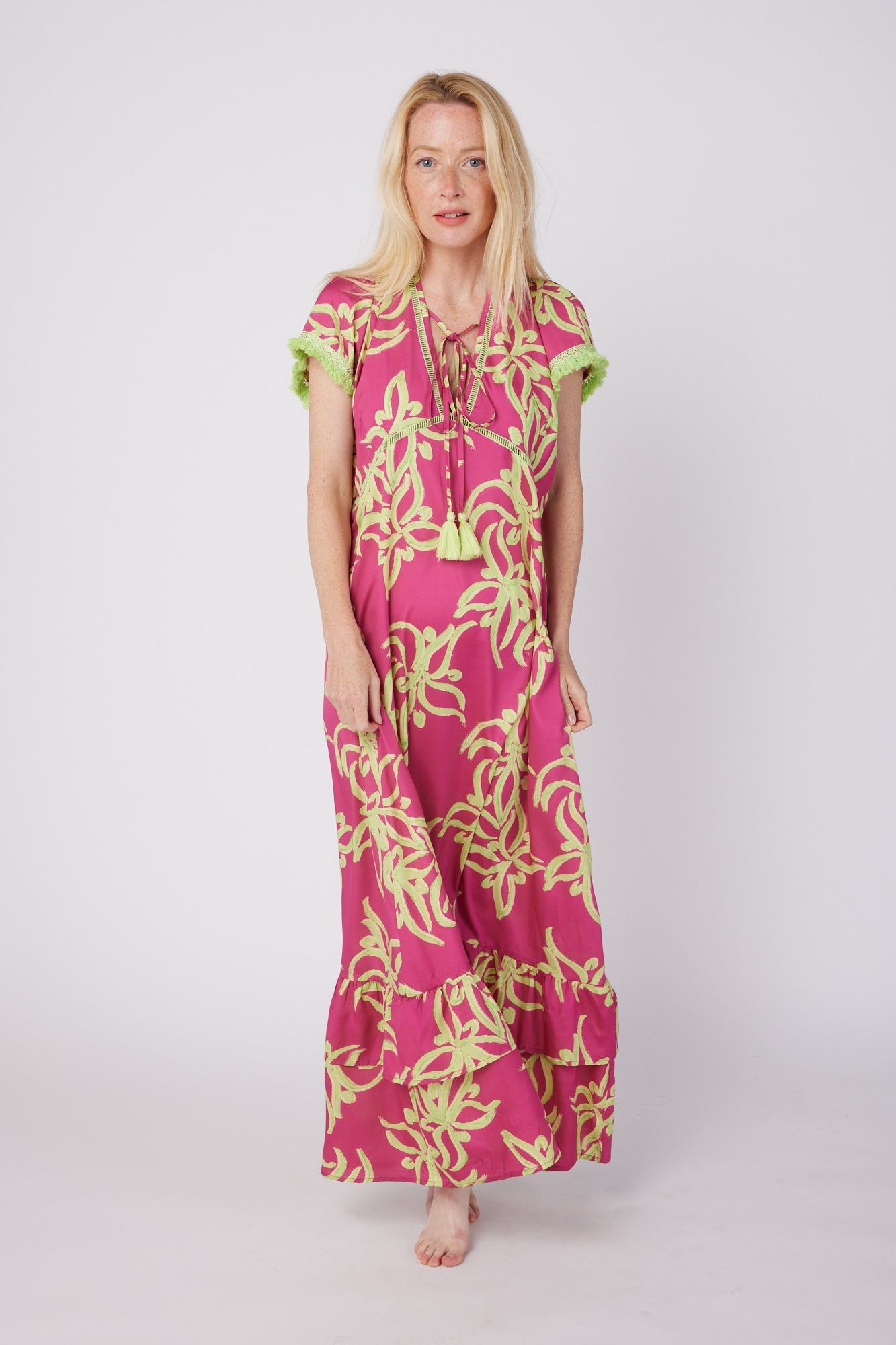 ModaPosa Brigida Short Sleeve V-Neck Maxi Dress with Fringe Trim in in Raspberry Lime Flower . Discover women's resort dresses and lifestyle clothing inspired by the Mediterranean. Free worldwide shipping available!