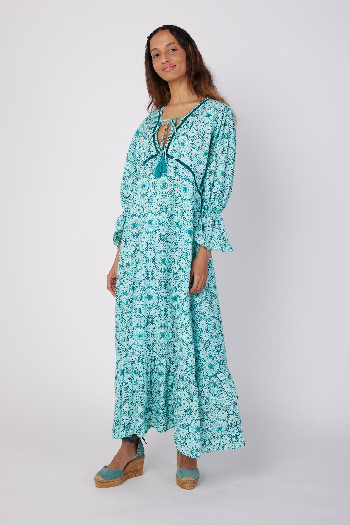 ModaPosa Brigida Ruffle Sleeve Swiss Dot V-Neck Maxi Dress in Moroccan Tile . Discover women's resort dresses and lifestyle clothing inspired by the Mediterranean. Free worldwide shipping available!