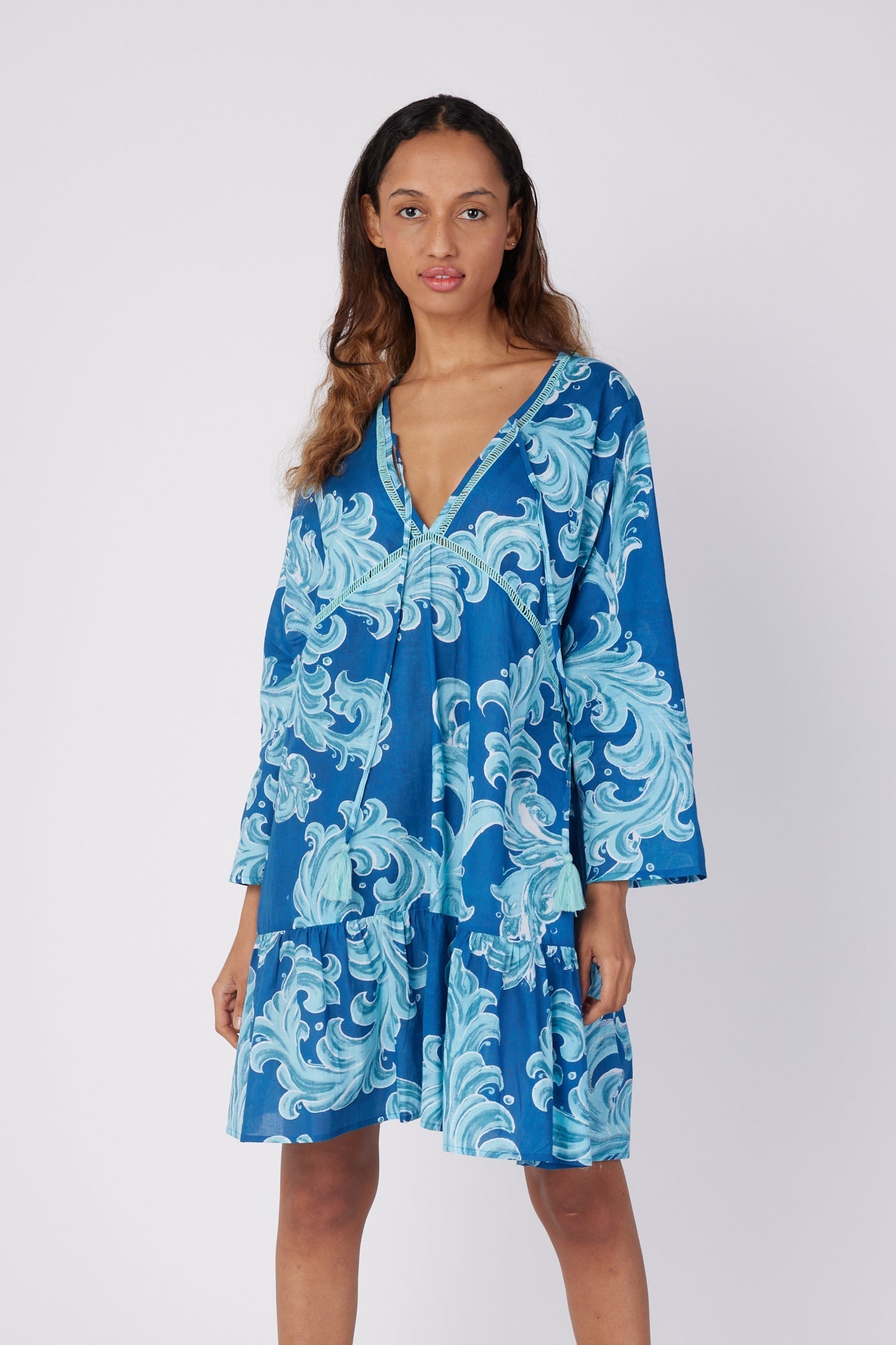 ModaPosa Brigida 3/4 Sleeve Ruffle Knee Length V-Neck Dress in Deep Blue Baroque . Discover women's resort dresses and lifestyle clothing inspired by the Mediterranean. Free worldwide shipping available!