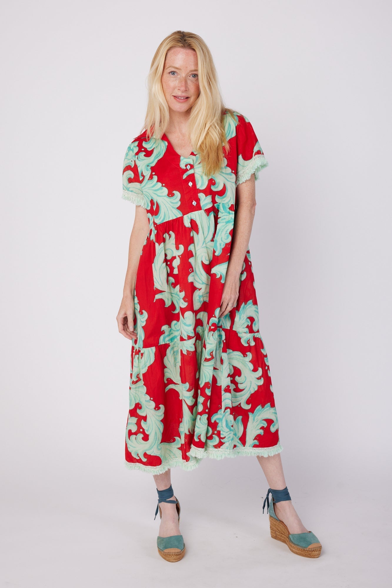 ModaPosa Cadenza Short Sleeve Midi Dress with Collar and Fringe Trim in Crimson Mist Baroque . Discover women's resort dresses and lifestyle clothing inspired by the Mediterranean. Free worldwide shipping available!
