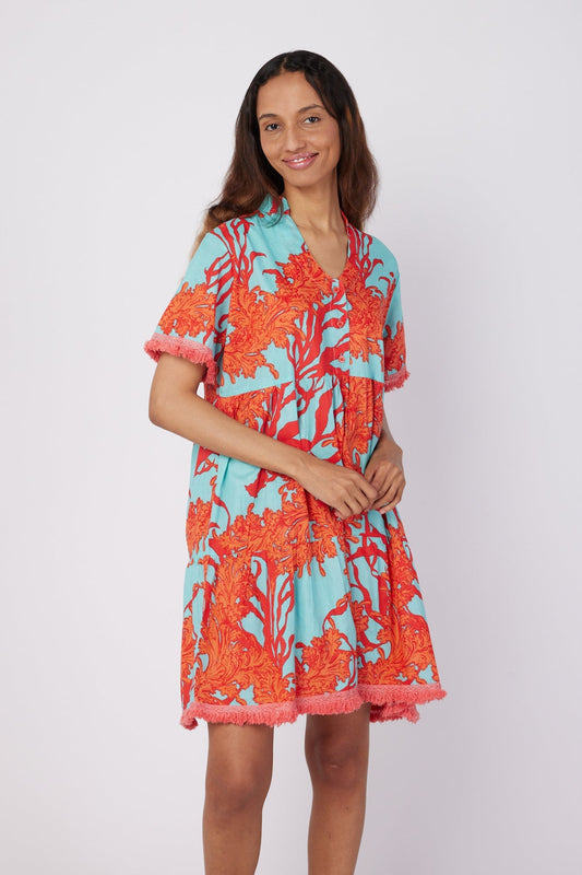 ModaPosa Cadenza Short Sleeve Knee Length Eyelet Dress with Band Collar in Turquoise Pink Coral . Discover women's resort dresses and lifestyle clothing inspired by the Mediterranean. Free worldwide shipping available!