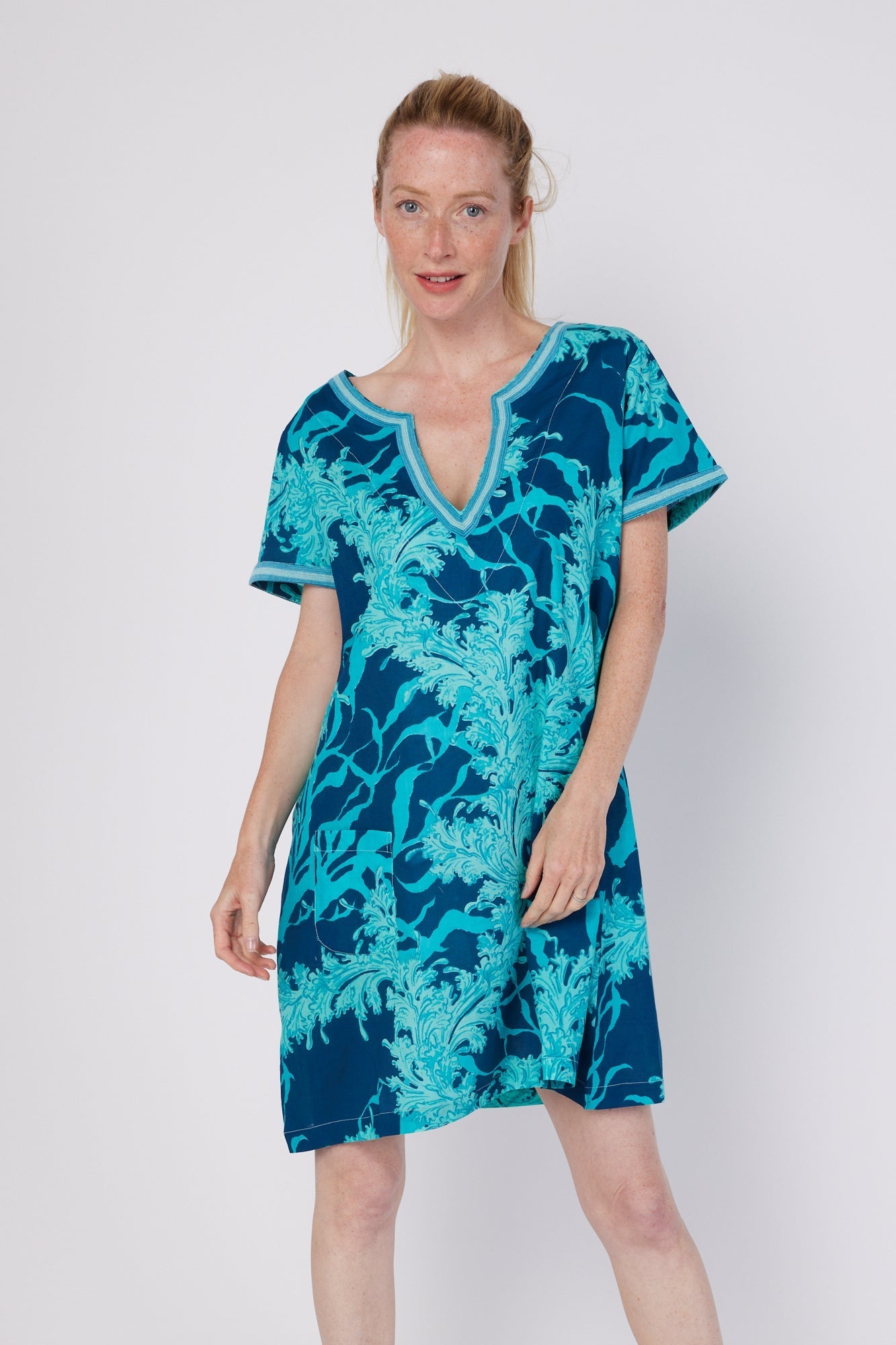 ModaPosa Giovanna 3/4 Bell Sleeve Embroidered Knee Length Caftan Dress in Navy Aqua Coral. Discover women's resort dresses and lifestyle clothing inspired by the Mediterranean. Free worldwide shipping available!