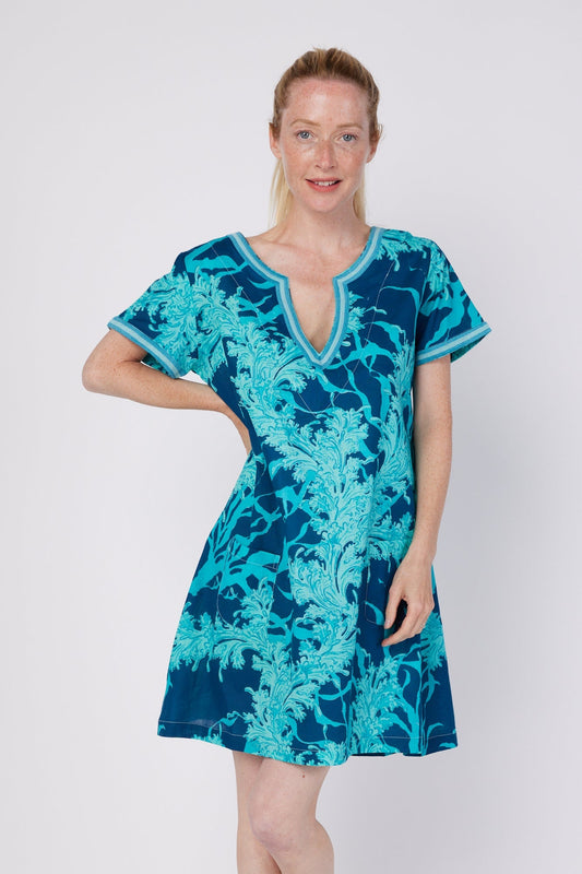 ModaPosa Giovanna 3/4 Bell Sleeve Embroidered Knee Length Caftan Dress in Navy Aqua Coral. Discover women's resort dresses and lifestyle clothing inspired by the Mediterranean. Free worldwide shipping available!