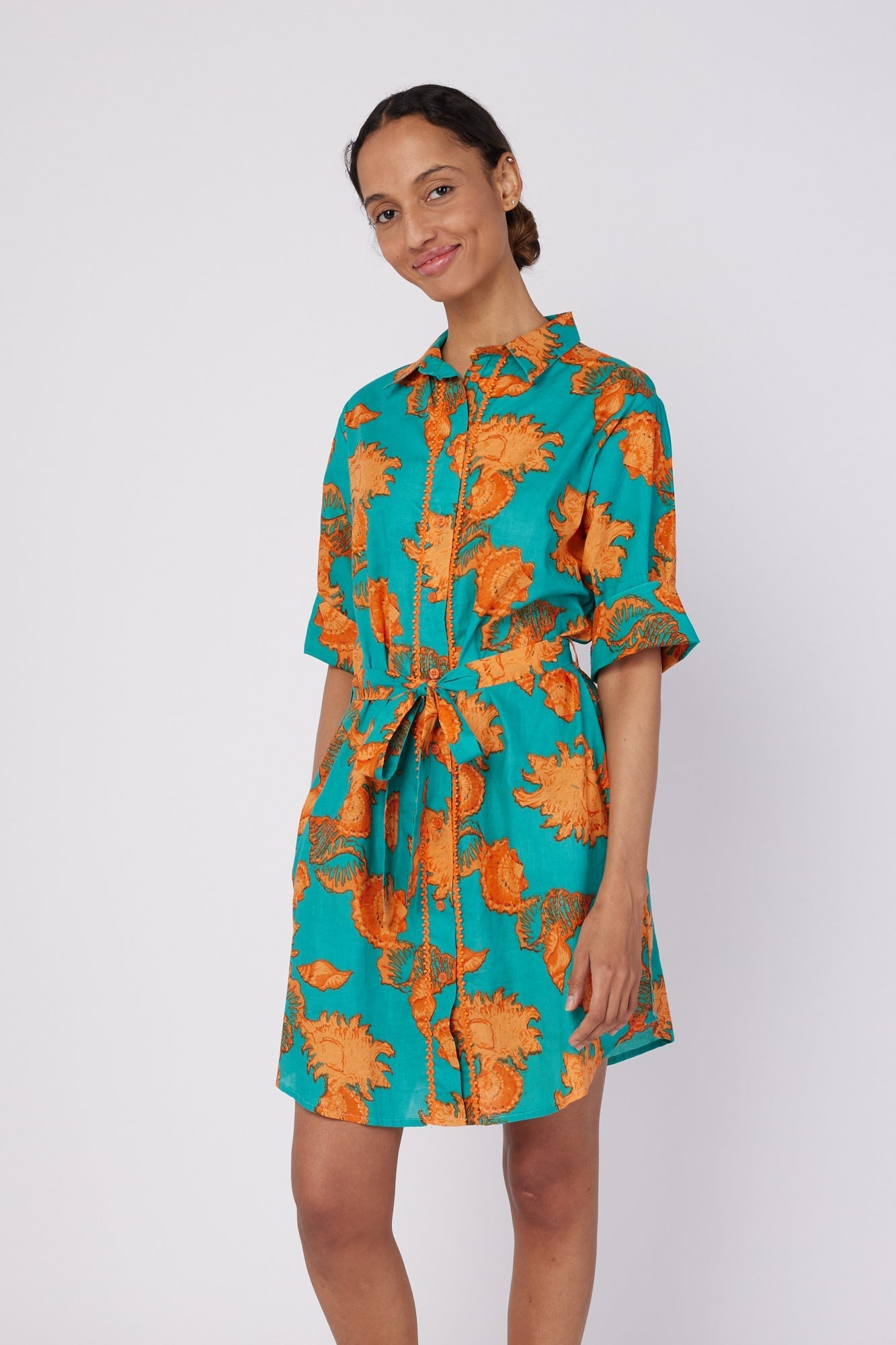 ModaPosa Carlotta 3/4 Sleeve Shirt Dress with Pockets and Detachable Belt in Turquoise Orange Shells . Discover women's resort dresses and lifestyle clothing inspired by the Mediterranean. Free worldwide shipping available!