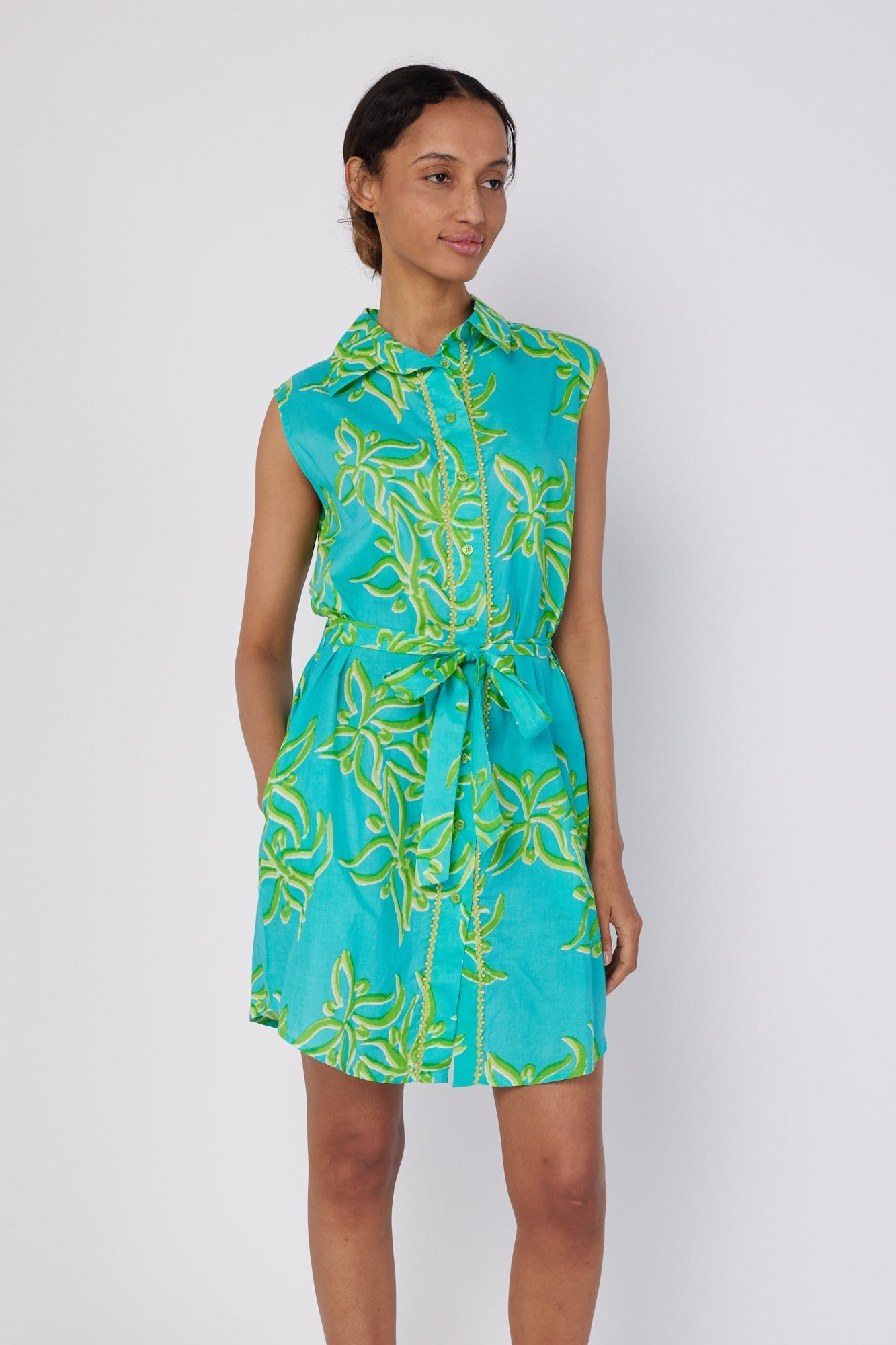 ModaPosa Carlotta Short Sleeve Shirt Dress with Pockets and Detachable Belt in Green Abstract Flower . Discover women's resort dresses and lifestyle clothing inspired by the Mediterranean. Free worldwide shipping available!