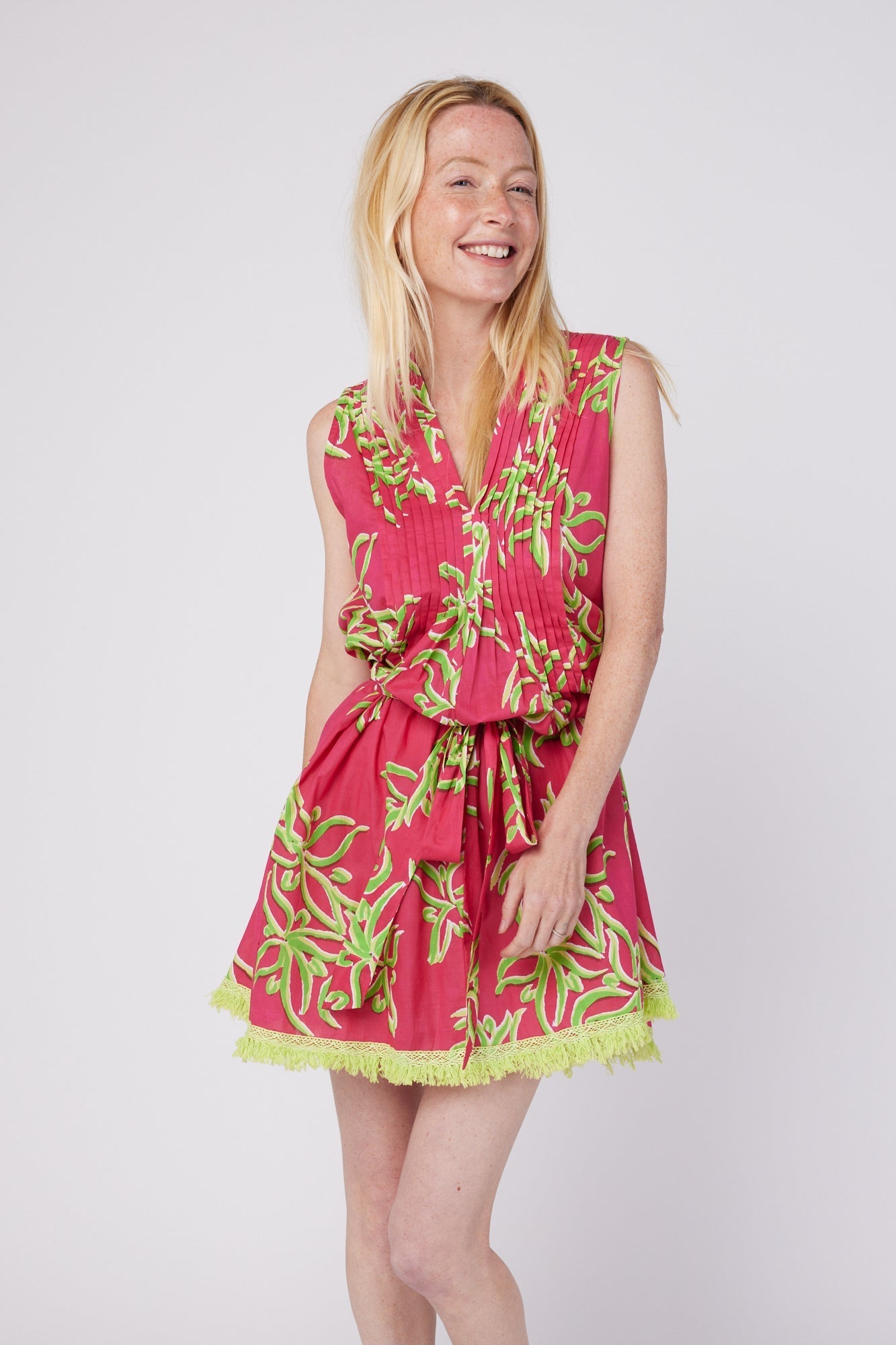 ModaPosa Felice Sleeveless V-Neck Puntuck Knee Length Dress with Detachable Belt in Raspberry Lime Flower . Discover women's resort dresses and lifestyle clothing inspired by the Mediterranean. Free worldwide shipping available!