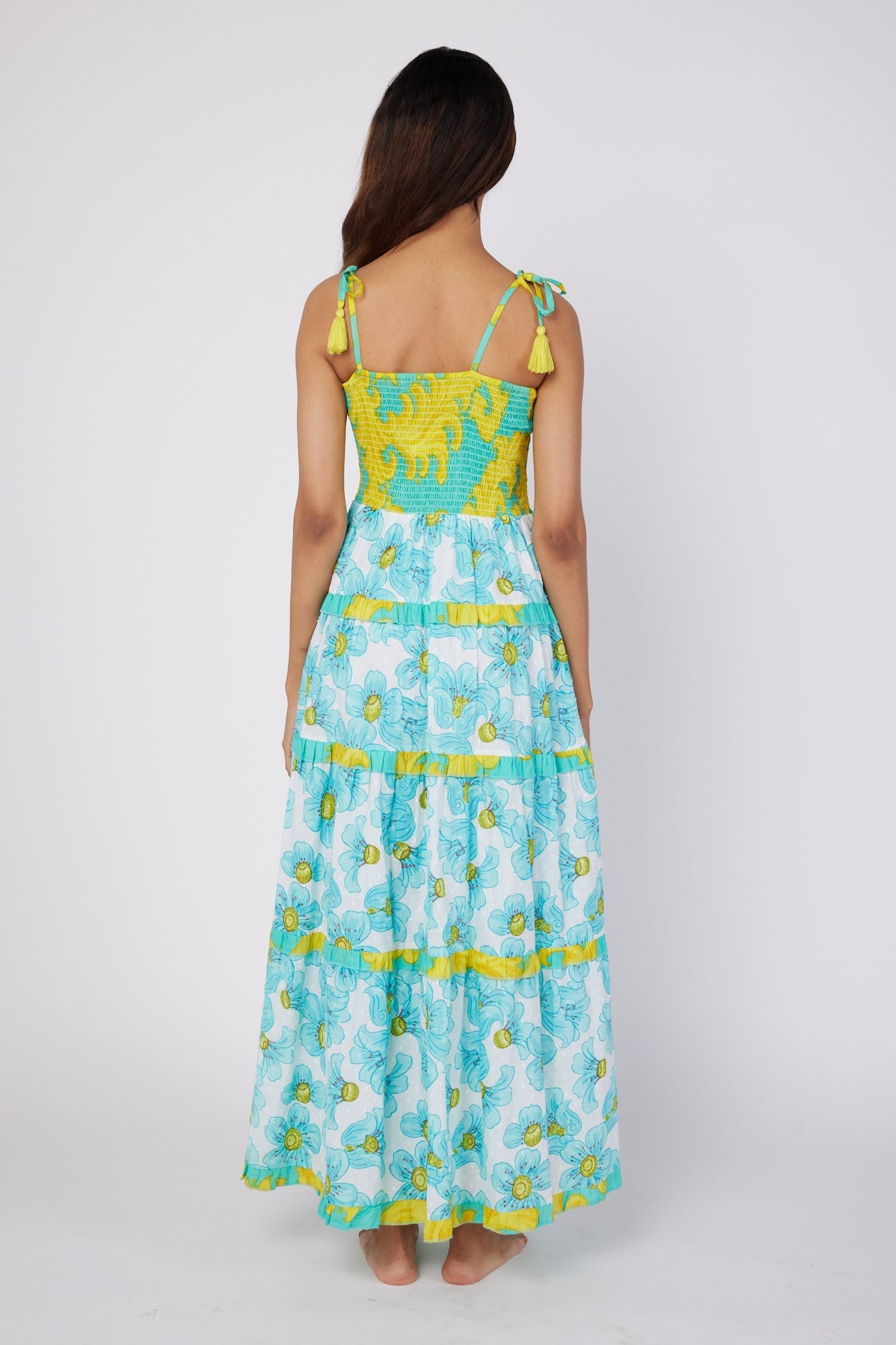 ModaPosa Dianora Spaghetti Strap Smocked Tiered Maxi Dress in Golden Floral Combo . Discover women's resort dresses and lifestyle clothing inspired by the Mediterranean. Free worldwide shipping available!
