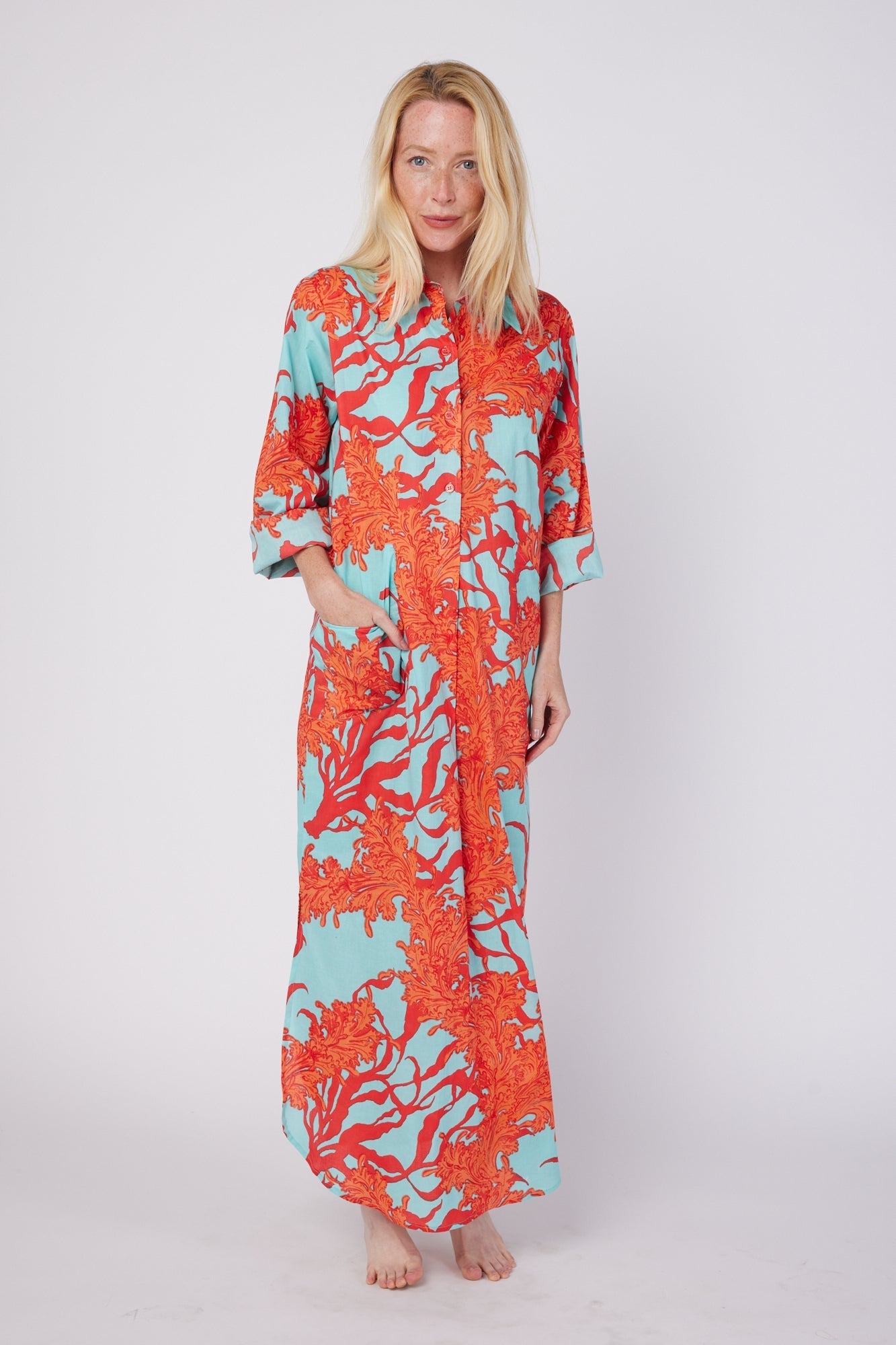 ModaPosa Gabriella 3/4 Sleeve Maxi Shirt Dress with Collar and Pockets in Turquoise Pink Coral . Discover women's resort dresses and lifestyle clothing inspired by the Mediterranean. Free worldwide shipping available!