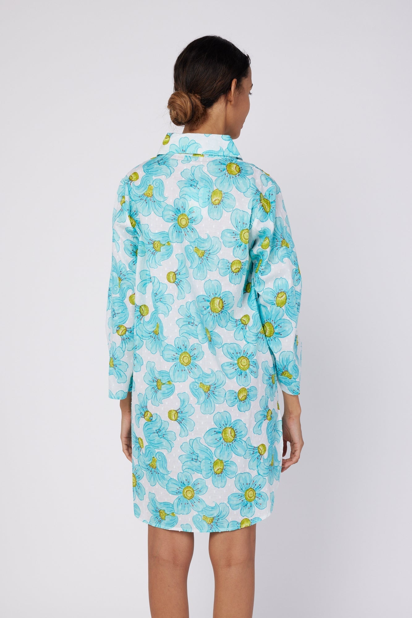 ModaPosa Gabriella 3/4 Sleeve Knee Length Shirt Dress with Collar and Pockets in Blue Floral . Discover women's resort dresses and lifestyle clothing inspired by the Mediterranean. Free worldwide shipping available!