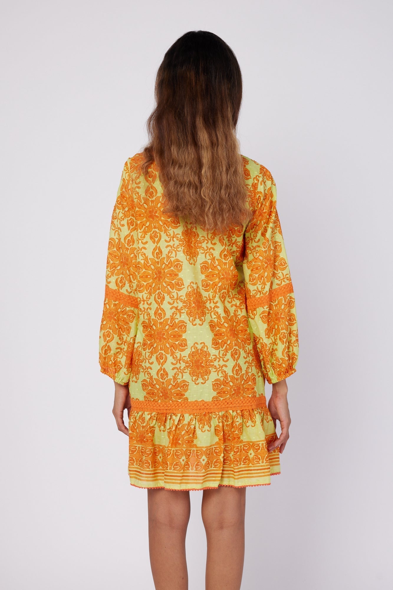 ModaPosa Ilaria Puff Sleeve Drop Waist Hand Embroidered Knee Length Dress with Lace Trim in Curacao Majolica . Discover women's resort dresses and lifestyle clothing inspired by the Mediterranean. Free worldwide shipping available!