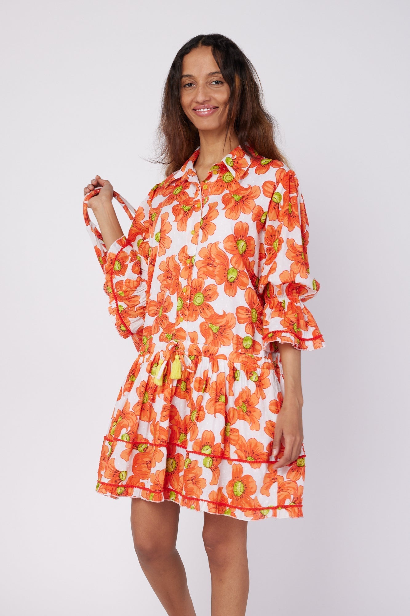 ModaPosa Penelope 3/4 Frill Puff Sleeve Drop Waist Mini Dress with Pockets in Poppy . Discover women's resort dresses and lifestyle clothing inspired by the Mediterranean. Free worldwide shipping available!