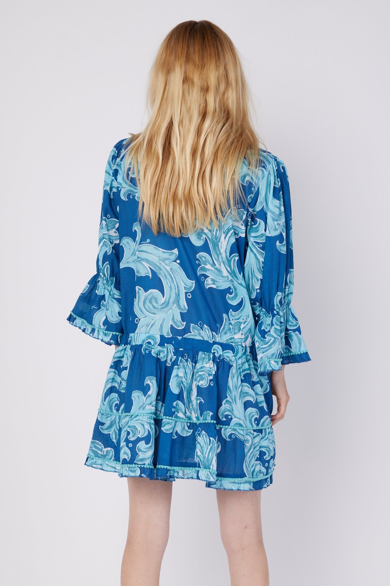 ModaPosa Penelope 3/4 Frill Puff Sleeve Drop Waist Mini Dress with Pockets in Deep Blue Baroque . Discover women's resort dresses and lifestyle clothing inspired by the Mediterranean. Free worldwide shipping available!