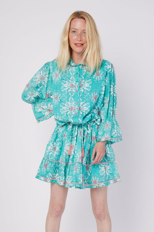 ModaPosa Penelope 3/4 Frill Puff Sleeve Drop Waist Mini Dress with Pockets in French Majolica . Discover women's resort dresses and lifestyle clothing inspired by the Mediterranean. Free worldwide shipping available!