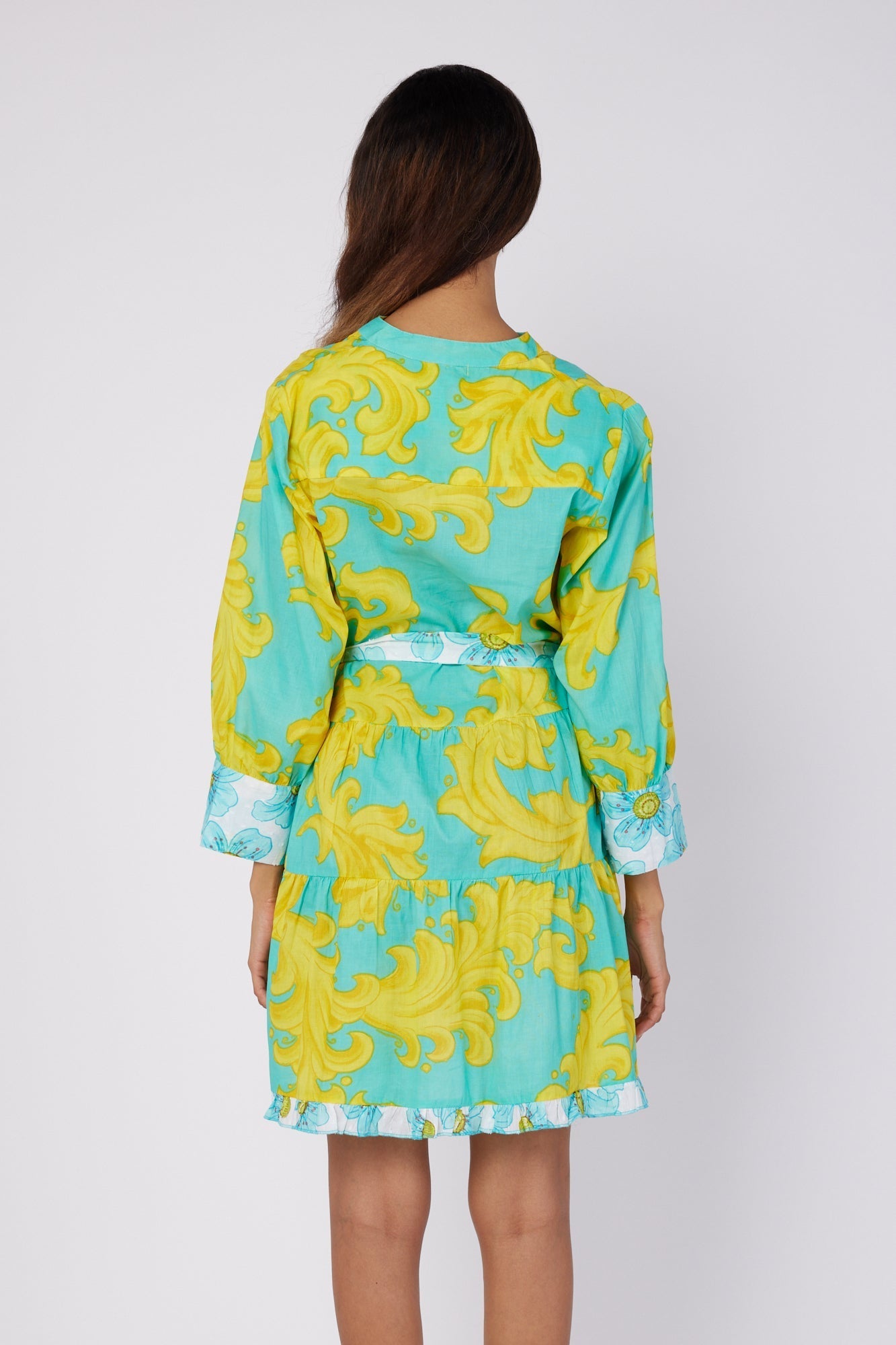 ModaPosa Alcee 3/4 Puff Sleeve Mini Dress with Detachable Belt in Golden Floral Combo . Discover women's resort dresses and lifestyle clothing inspired by the Mediterranean. Free worldwide shipping available!
