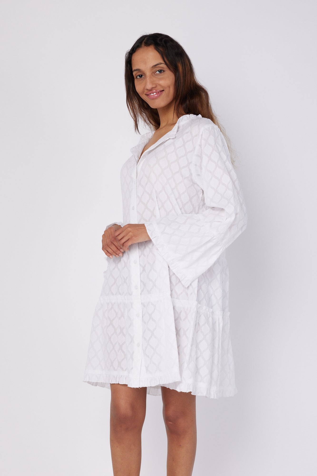 ModaPosa Alcee 3/4 Frill Sleeve Ruffle Knee Length Relaxed Jacquard Beach Dress in White . Discover women's resort dresses and lifestyle clothing inspired by the Mediterranean. Free worldwide shipping available!