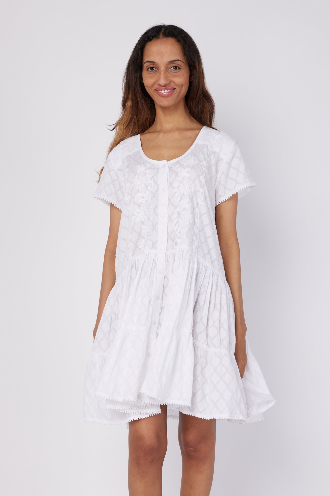 ModaPosa Simonetta Cap Sleeve Scoop Neck Drop Waist Hand Embroidered Jacquard Knee Length Dress in White . Discover women's resort dresses and lifestyle clothing inspired by the Mediterranean. Free worldwide shipping available!