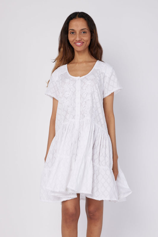 ModaPosa Simonetta Cap Sleeve Scoop Neck Drop Waist Hand Embroidered Jacquard Knee Length Dress in White . Discover women's resort dresses and lifestyle clothing inspired by the Mediterranean. Free worldwide shipping available!