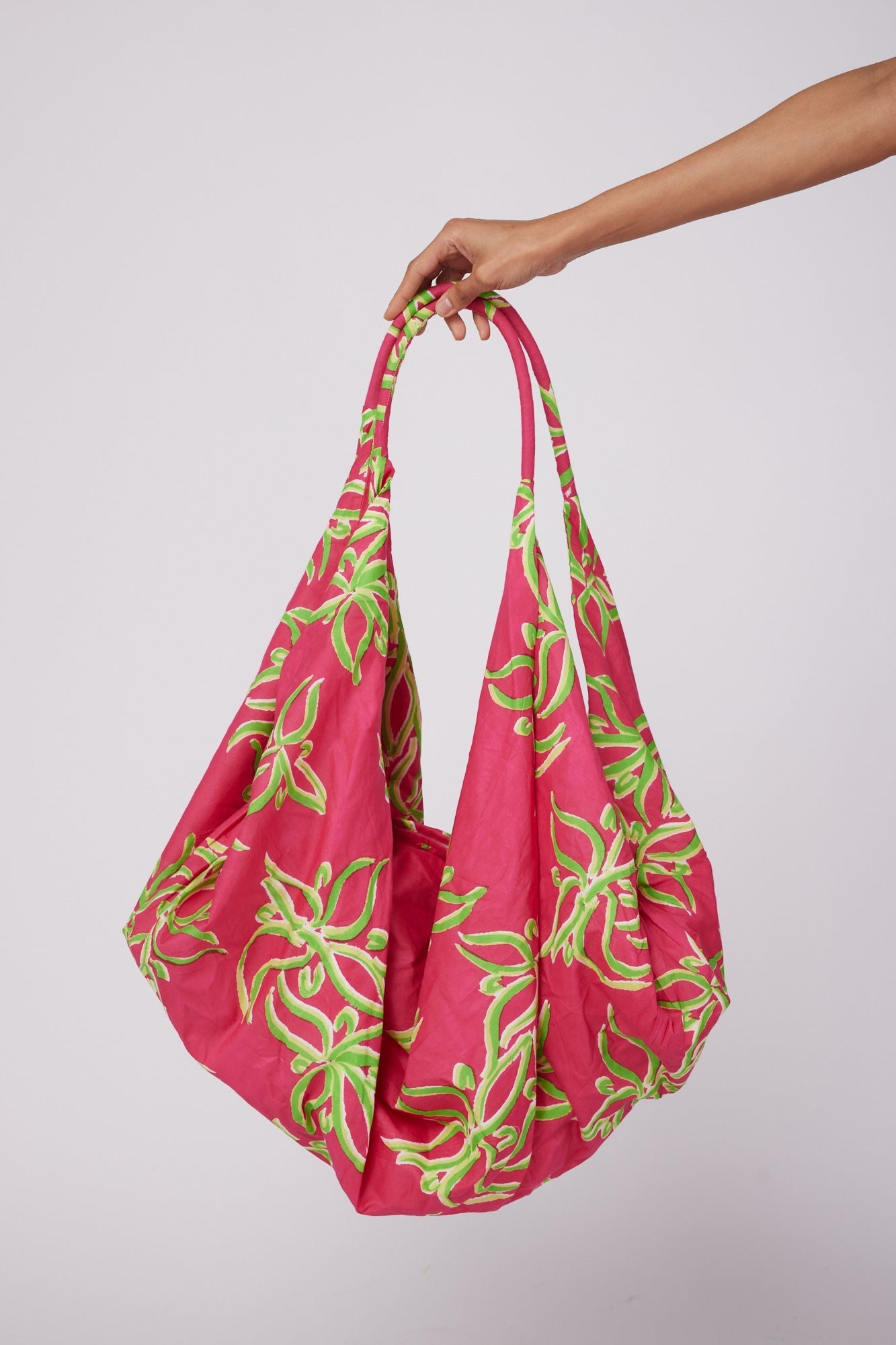 ModaPosa Adra Lined Hobo Beach Bag with Zip Closure in Raspberry Lime Flower . Discover women's resort dresses and lifestyle clothing inspired by the Mediterranean. Free worldwide shipping available!