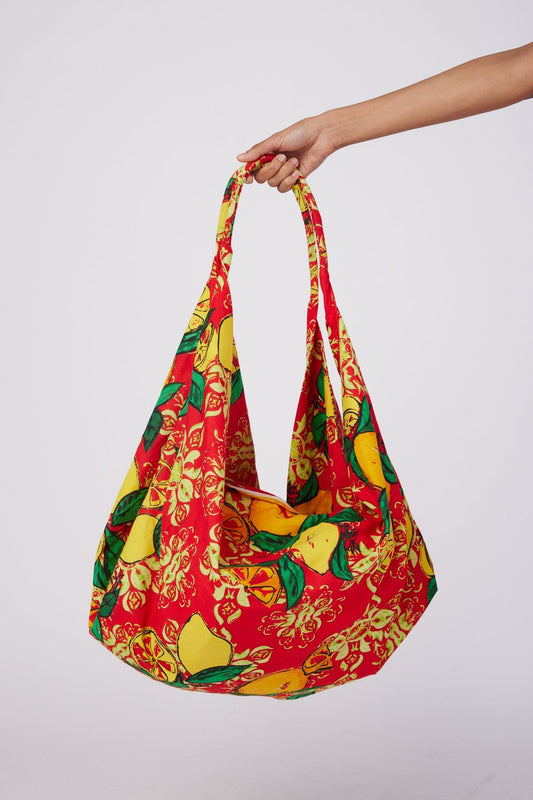 ModaPosa Adra Lined Hobo Beach Bag with Zip Closure in Red Citrus Majolica . Discover women's resort dresses and lifestyle clothing inspired by the Mediterranean. Free worldwide shipping available!